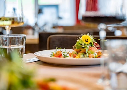 salad decorated with a yellow flower